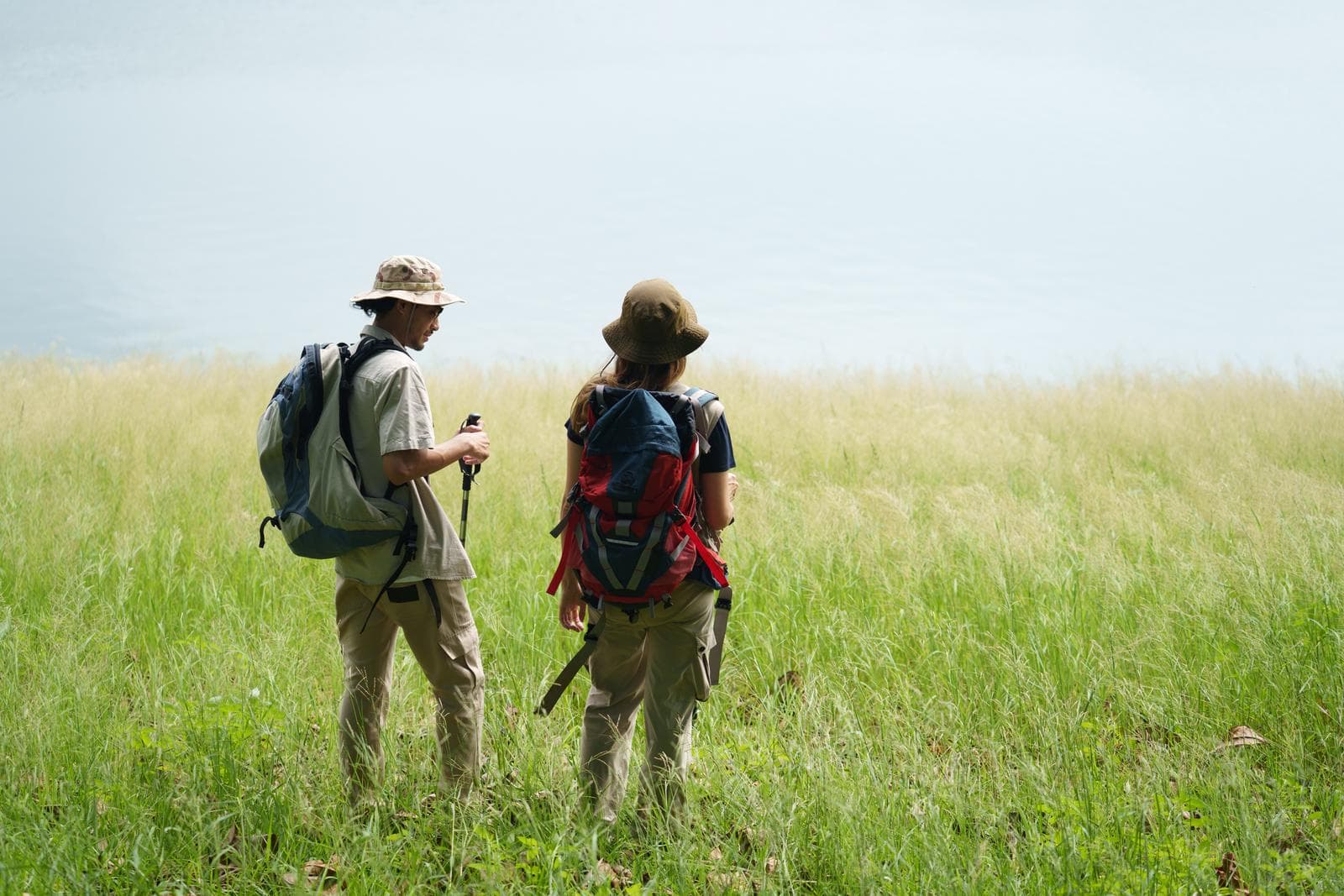 Tourists walking in the vast savannah